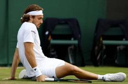 开云体育在线-年终总决赛险胜温网，西西帕斯统治全场